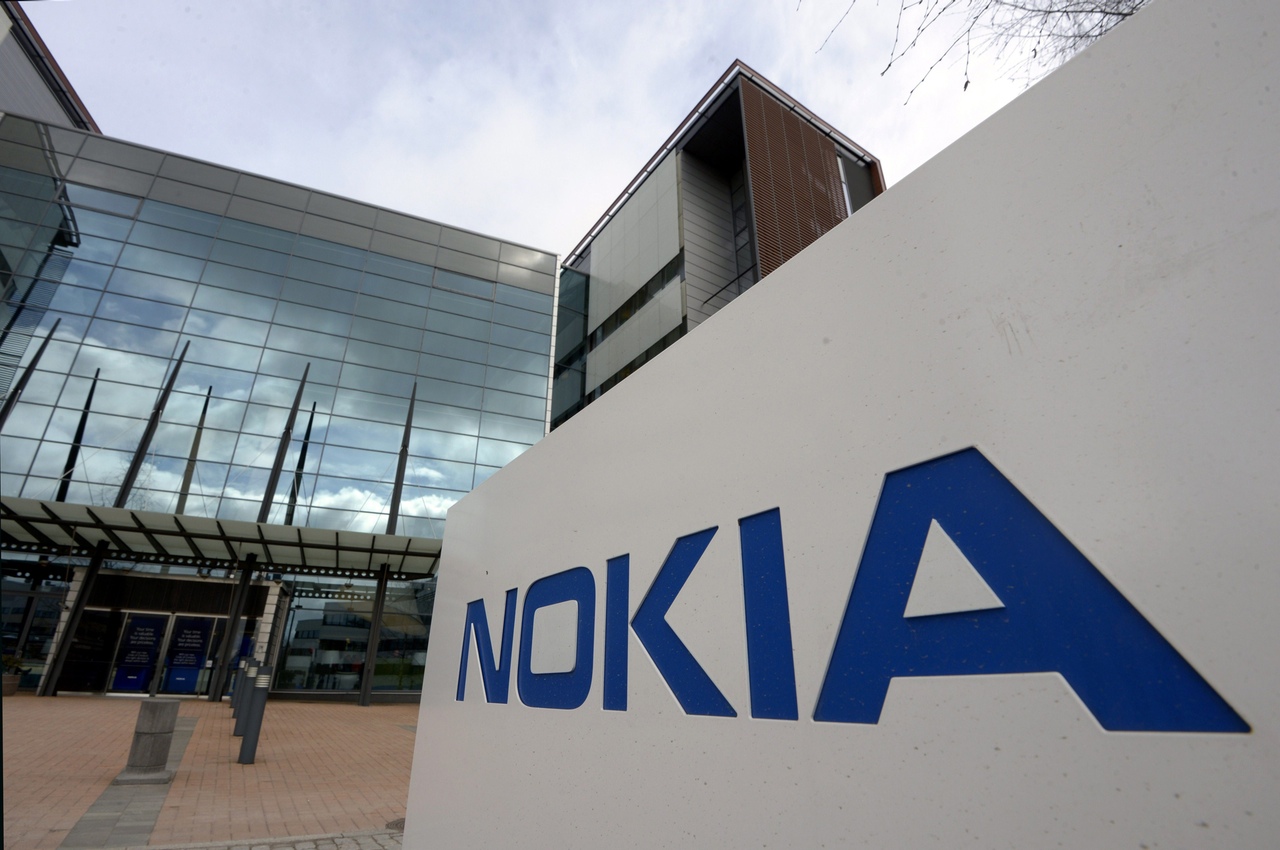 Exterior view of the head office of communication and information technology company Nokia on April 14, 2015, in Espoo, Finland. Finland's Nokia announced on April 14, 2015 that it was in advanced talks to purchase all of its Franco-American rival Alcatel-Lucent. AFP PHOTO / LEHTIKUVA / MARKKU ULANDER +++ FINLAND OUT