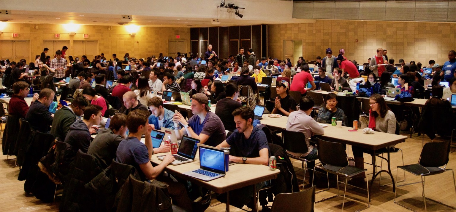 Hackathon in progress, large group, hall