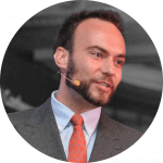 man in suit with microphone