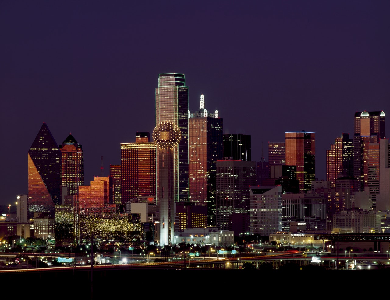 Night view of Dallas Texas Renaissance Tower Comerica Bank and Fountain Place with other buildings in the skyline