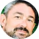 man, smiling, brown and grey hair, beard, moustache