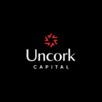 Uncork Capital logo, white letters, black background, red circle shape above the name