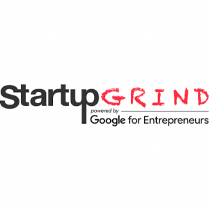 Startup grind powered by google with black and red letters on a white background