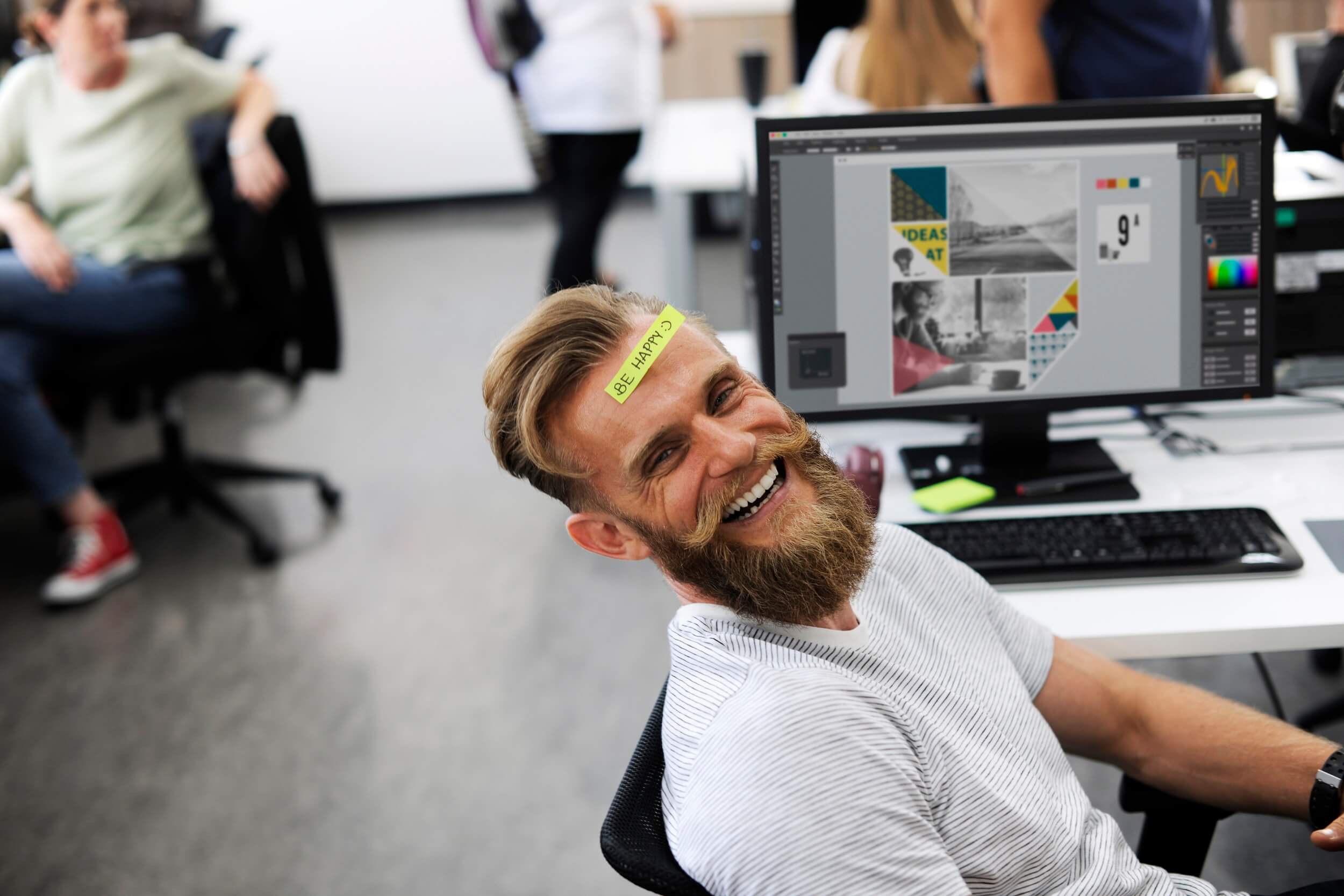 Photo by rawpixel.com from Pexels man in an office with a sticker on his forehead