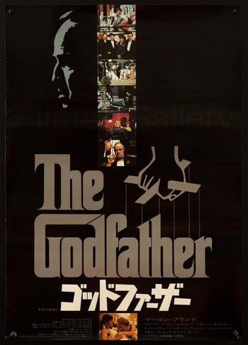 the godfather movie poster with stills from the move, grey and white text over a black background and graphic of a puppeteers hand