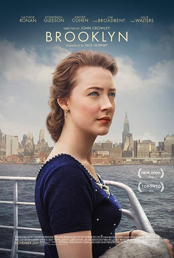 Brooklyn movie poster - Woman wearing a dress stands on a boat on the river with new york in the background, white text overlaid