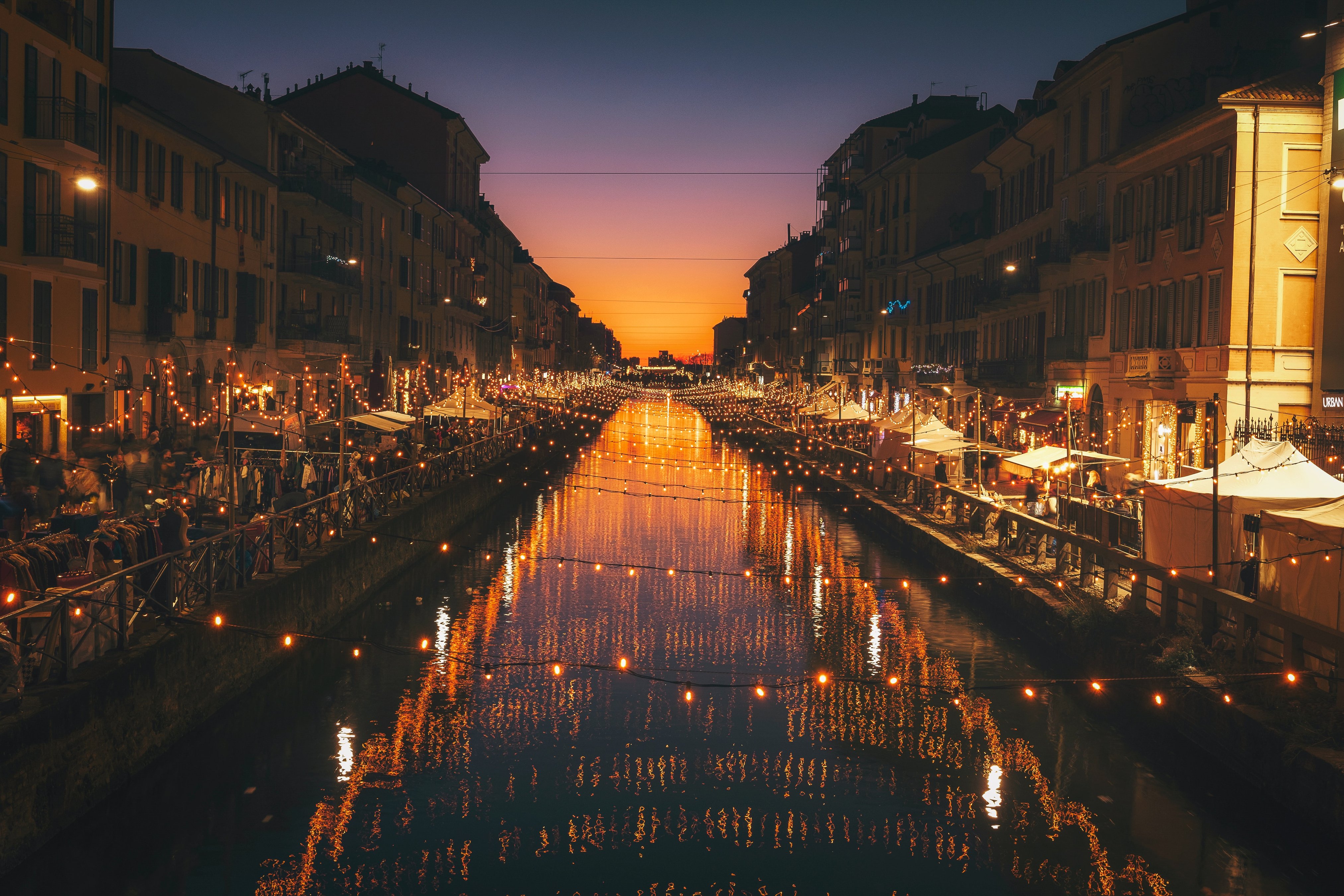 picture of shops on a river in milan, italy