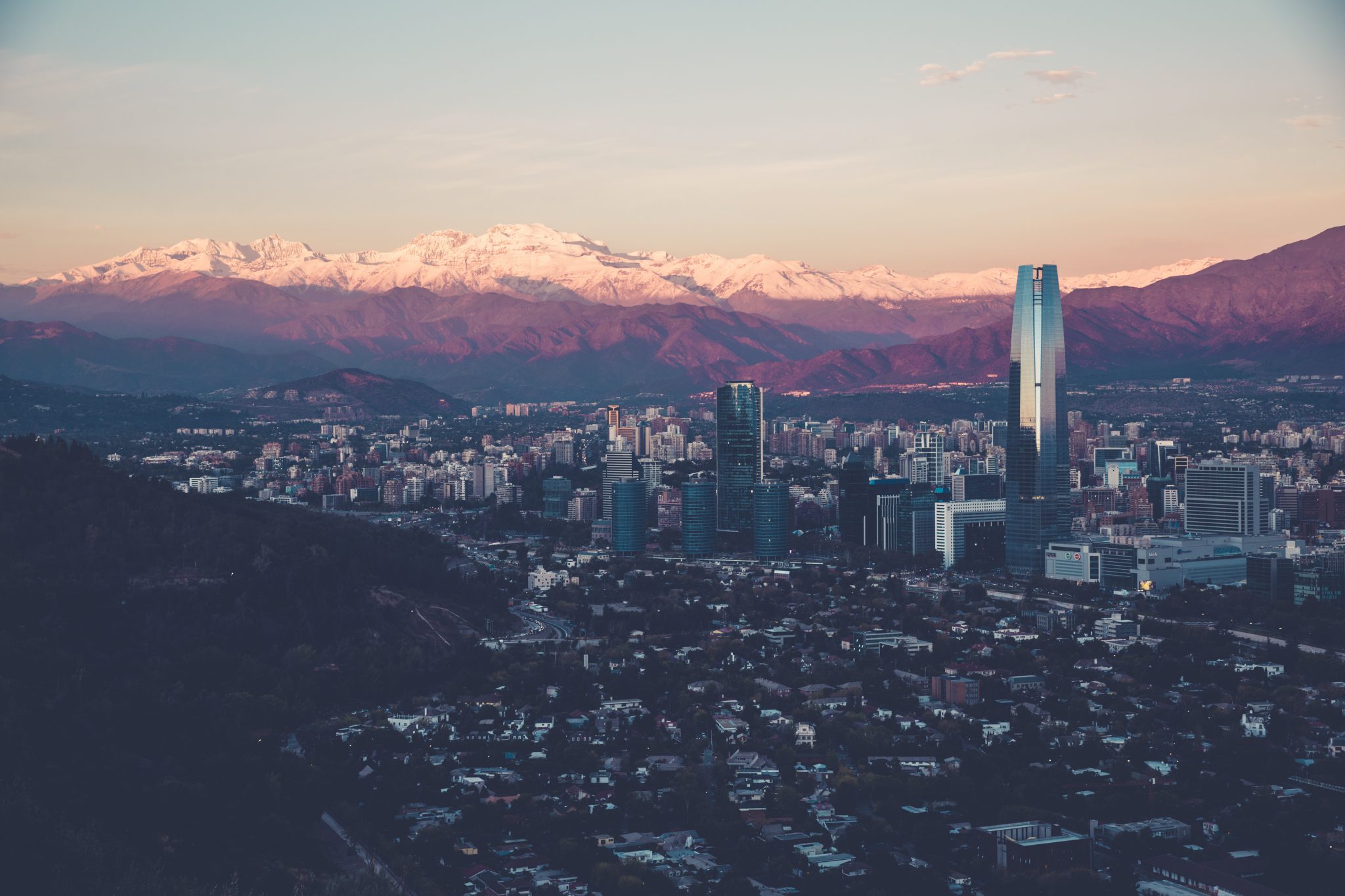 overview shot of santiago, chile with mountains in background