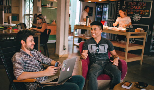 Two guys networking in a common space