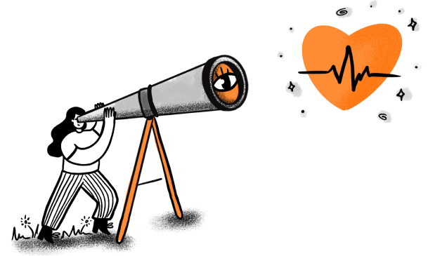 Girl looks at a heart though a telescope