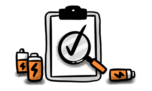 Paper looks with a magnify glass surrounded with three batteries